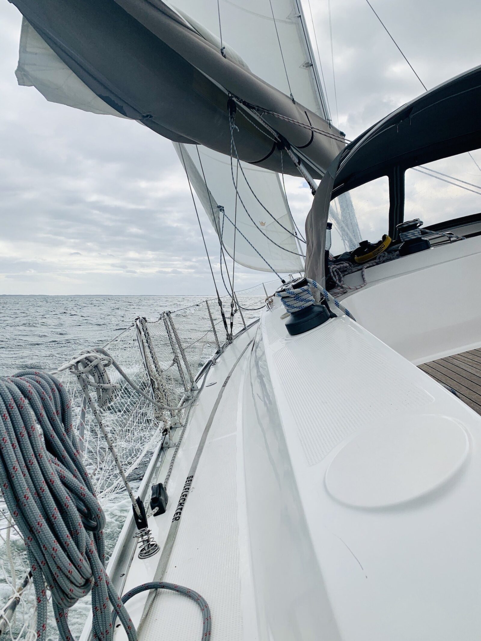 Photo of a sailboat out on the sea