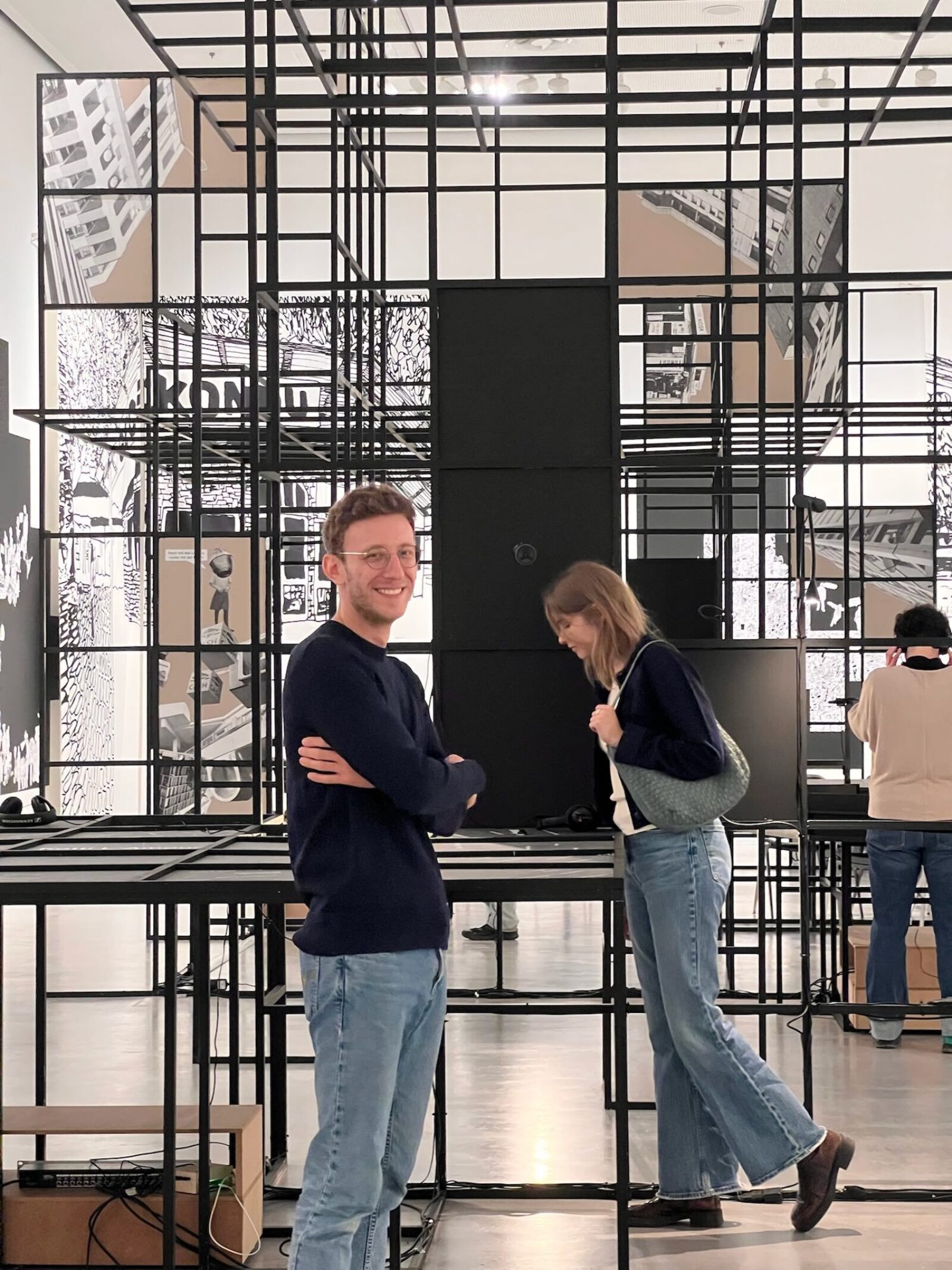 Two of us inside Berlinische Galerie, looking at art, smiling at the camera