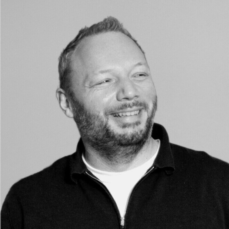 Photo of John Ripmeester, laughing and looking slightly sideways